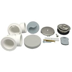 an assortment of different types of parts for a stove top and oven door knobs