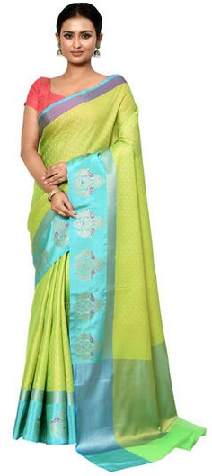 Green color Saree in Organza Silk fabric with Weaving work Green Saree With Zari Weaving For Party, Party Green Dupatta With Zari Weaving, Green Art Silk Saree For Celebration, Green Silk Saree For Celebration, Green Saree With Resham Embroidery For Celebration, Green Traditional Wear With Unstitched Blouse For Celebration, Green Blouse Piece For Diwali Celebration, Green Saree Fabric With Zari Weaving, Green Zari Weaving Wedding Fabric