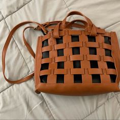 Excellent Condition. Chic Tan Satchel For Errands, Chic Tan Satchel, Chic Brown Satchel For Spring, Chic Tan Bag For Fall, Chic Brown Bucket Bag With Intrecciato Weave, Brown Basket Bag With Intrecciato Weave, Brown Intrecciato Weave Satchel Tote, Brown Rectangular Bucket Bag With Intrecciato Weave, Basket-shaped Woven Leather Bucket Bag For Shopping