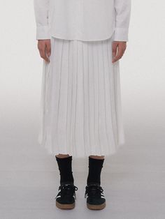 Editor's NotesThe Pleated Long Skirt exudes a serene mood with its calm pleats and subtle shine. It boasts a clean line without any unnecessary wrinkles, and a luxurious mood with ample length and pleats. It is made of a fabric with a moderate thickness, which is less transparent even without lining, and it is comfortable to wear as it boldly omits lining. It is made by blending viscose and modal appropriately, so you can feel a luxurious shine and soft texture. It has an open and closing zipper placed on the side, allowing you to feel a slim fit, and has a closure ring to close it securely. It is proposed in two colors: white and dark navy, which are good for wearing in spring and fall due to their thickness.-Serene mood with calm pleats and subtle shine-Clean and neat line without any un White Long Skirt, Pleated Long Skirt, Soft Texture, White Skirts, Spring And Fall, Dark Navy, Long Skirt, Blending, Wrinkles