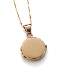 This classic 14-karat yellow gold circle locket features a brushed finish on the outside and a photo slot inside to hold a favorite memory. Set on a matching box chain  it can accommodate a custom engraving on the front and back for further personalization. Circle Locket, Gold Locket, Gold Circle, Box Chain, Custom Engraving, Locket, A Photo, Yellow Gold, Chain