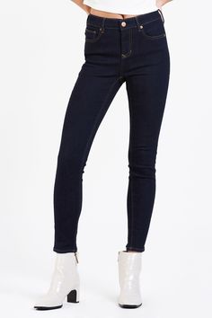 image of a female model wearing a GISELE HIGH RISE SKINNY JEANS BREAKWATER DEAR JOHN DENIM Tencel Denim, Denim Essentials, Winter Color, Leather Pencil Skirt, Medium Wash Jeans, Slim Straight Jeans, Sweater Sale, Light Wash Jeans, Dark Wash Jeans