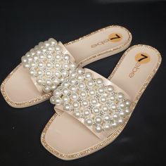 Nwt Bebe "Shirin", Size 7 Pearl And Silver Bead Embellished Toe Strap Rhinestones Surround Outer Edge Of Footbed Synthetic Sole And Upper Pearl Sandals For Summer Party, Embellished White Synthetic Sandals, Summer Party Pearl Sandals, Elegant White Beaded Sandals, Elegant Beaded Synthetic Sandals, White Flat Embellished Sandals, White Embellished Flat Sandals, Elegant Beaded Flat Sandals, Rhinestone Slides