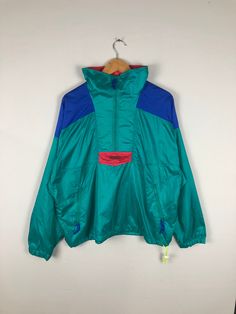 *ITEM: Vintage Columbia Windbreaker Large Unisex 90's Columbia Colorblock Jacket Outdoor Sportswear  Columbia Outfits Jacket Size L              *ITEM DETAILS: 👇🏻 Please be aware that all vintage items will usually show a few signs of wear or fading due to age, but anything visible such as stains or holes, and serious flaws have been photographed.For any further information on this item please contact us and we will be happy to help. *SIZE: LARGE  * ACTUAL SIZE MEASUREMENT: 👇🏻 *PIT TO PIT(WI Green Color Block Track Jacket For Sports, Sporty Green Color Block Track Jacket, 90s Green Sports Windbreaker, Green Color Block Track Jacket For Streetwear, Sporty Green Outerwear With Contrast Color, Retro Sports Windbreaker With Pockets, Sporty Multicolor Patchwork Windbreaker, Retro Green Track Jacket For Outdoors, Retro Green Track Jacket For Outdoor