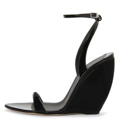 Elevate your style with these chic Black Patent Leather Wedge Sandals. Featuring an open-toe design and ankle strap, they offer both comfort and sophistication for any occasion. Color: Black Material: Patent leather Heel Type: Wedge heel Heel height: 4.13" / 105 mm approx Product measurements were taken using size 8. Please note that measurements may vary by size. The sandals are crafted from black patent leather material. With a matching covered curved wedge, and a matching adjustable ankle strap. Toe: Open toe Handcrafted US sizing. Fits true to size. Spring Ankle Strap Wedge Sandals With Sculpted Heel, Chic Wedge Heel Sandals With Padded Heel, Modern High Heel Wedge Sandals With Wrapped Heel, Black Open Toe Wedge Sandals With Heel Strap, Evening Wedge Sandals For Summer, Summer Evening Wedge Sandals, Black Wedge Sandals With Heel And Ankle Strap, Modern Wedge Sandals With Wrapped Heel And Round Toe, Modern Wedge Sandals With Wrapped Heel