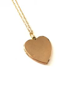 "Vintage Gold Filled Heart Locket Necklace by W&H Co., Antique Victorian Heart Locket Beautiful heart locket with clear rhinestones : Measures 1 1/8\" wide x just under 1 3/8\" tall. Chain is 24\" long. Marks: Inside it is marked W&H Co. for the Wightman & Hough Company. They were located in Providence, R.I. and made sweetheart necklaces from 1856 until 1922. They were a well known maker of beautiful high quality lockets of the time. No Marks for metal content. What is it made of: Th Heart Locket Necklace, Costume Earrings, Heart Locket, Bar Earrings, Shell Earrings, Beautiful Heart, Locket Necklace, Star Earrings, Clear Rhinestones