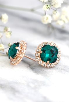 Emerald Earrings, Bridal Emerald Stud Earrings, Bridesmaids Earrings, Green Swarovski Crystal Earrings, Emerald Crystal Bridal Earrings This handmade cushion cut shape Swarovski Earrings 24 k plated over brass are designed to make an impact set with black diamond Crystal and finished with white small clear crystal halo An elegant way to finish day or evening looks sweep your hair to the side to showcase. Petite Delights is an Official SWAROVSKI® Branding Partner Official Swarovski Elements® Part Emerald Earrings For Wedding, Green Cluster Earrings For Wedding, Emerald Round Earrings For Party, Round Emerald Earrings For Party, Elegant Green Bridal Earrings For Bridesmaids, Green Crystal Earrings For Wedding, Green Round Crystal Earrings For Wedding, May Birthstone Earrings For Wedding, Wedding Crystal Earrings For May Birthstone