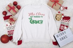 Mrs. Claus But Married to the Grinch Sweatshirt (Adult) Custom Request Information If you would like a different color shirt, please indicate your request in the cart Special instructions for seller field. We will do our best to accommodate realistic requests. Custom requests may require additional processing time. Care Instructions (non-custom) : Use cold water Do not utilize dye Do not bleach Wash dark & bright colors separately Tumble dry at low heat settings Warm Iron Care Instructions (cust Disney Shirts Christmas, Hoodies Photoshoot, Married To The Grinch, Beauty And The Beast Disney, The Beast Disney, Beast Disney, Mrs Clause, Xmas Sweater, Holiday Sweatshirt