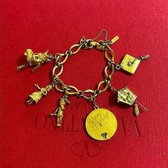 Sb3 Vintage C.1960s Monet Goldtone Bracelet Rare!! Total 6pcs Charms. Graduation Hat, Graduation Baby, Cuckoo Clock (1 Missing Part),Hula Girl (Skirt Moves), Dog W/Crown (If You Pull Tassel, Eyes & Tung Move), Birthday Charm (Changeable Date) As You See, Wear/Scratches/Discoloration Shown But Very Good Shape W/Working Safety Clasp! 7” Dont Miss This Rare & Beautiful Piece!! I Don't Polish Item & Just Send As Is. You Can Polish Whenever You Wish Price Is Firm Item Only (Unless I Mention Abt Packa Vintage Brass Charm Bracelets, Vintage Metal Charm Bracelet, Vintage Charm Bracelet For Party, Vintage Brass Bracelets With Charm, Collectible Vintage Bracelets, Collectible Vintage Charm Bracelet, Vintage Collectible Bracelets, Vintage Collectible Charm Bracelet, Vintage Formal Jewelry With Charms