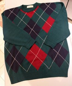 Vintage GLENMORE Lambswool Argyle Crewneck Sweater - Sz 42  (US XL) Size:  42 is marked - web site notes that Glenmore sweaters have a generous cut - and this is a Men's Sz XL 100% Pure Lambswool  Pattern:  Front of sweater is colorful argyle pattern.  The back of the sweater is solid (dark) green. Colors:  Dark Green, Navy Blue, Strong Red, with Pure White Accent  Size tag is 42, but is generous and would fit a large also - see measurements (laid flat to measure) - please compare to a sweater y Diamond Sweaters, Dark Green Sweater, Argyle Pattern, Argyle Sweater, Green Diamond, White Accents, Green Sweater, Crewneck Sweater, Pure White