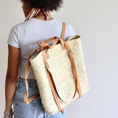 Aiden Straw & Leather French Market Backpack - Tan - Holistic Habitat Summer Daily Use Shoulder Backpack, Everyday Summer Straw Backpack, Summer Everyday Straw Backpack, Straw Backpack With Braided Handles For Travel, Summer Standard Backpack With Adjustable Strap, Everyday Summer Standard Backpack, Standard Backpack For Everyday Summer Use, Everyday Satchel Backpack For Summer, Daily Use Straw Backpack