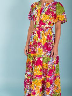 Indulge in the beauty and charm of summer with our Daffodil Garden Maxi Dress. Featuring a vibrant floral print, this dress is the perfect addition to your wardrobe. Made with lightweight material and a flowing design, it offers both style and comfort. Make a statement and brighten up any occasion with this must-have dress! Material: 50% Cotton, 50% Rayon Care: Machine wash cold. Tumble dry. Size. Fits true to size. Summer Midi Dress With Vibrant Print For Garden Party, Multicolor Print Sundress For Garden Party, Multicolor Floral Midi Dress For Beach, Multicolor Floral Dress With Vibrant Print For Garden Party, Vibrant Multicolor Floral Dress For Garden Party, Summer Sundress With Vibrant Print For Garden Party, Summer Multicolor Print Midi Dress For Garden Party, Multicolor Summer Midi Dress For Garden Party, Summer Garden Party Multicolor Print Maxi Dress