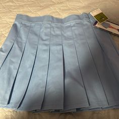 Brand New Pleated Blue Tennis Skirt Great Condition Blue Pleated Skirt For School, Blue Pleated Skirt For School In Spring, Blue Pleated Tennis Skirt For School, Blue Tennis Skirt For School In Summer, Blue Skort For School In Summer, Blue Skort For School And Summer, Blue Casual Pleated Skirt For School, Casual Blue Pleated Skirt For School, Blue High Waist Pleated Tennis Skirt