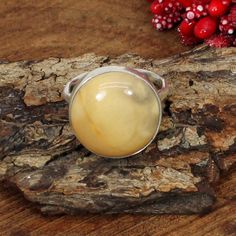 SDR-1609 Description : Gemstone : Yellow Aventurine Color : Yellow Stone Size : 16 X 16 MM Approx Stone Shape :- Round Stamp :- 925 Metal : 925 Sterling Silver Weight : 4.39 Gram Approx Handmade Item Made to order This Ring is made to Order. Processing Time :- This is handmade item and we need 3-5 days to ship your order . Yellow Aventurine Metaphysical Properties: Use Aventurine to reduce/absorb/protect against electromagnetic and environmental pollution. Yellow Aventurine can assist in removin Untreated Round Opal Ring For Gift, Untreated Round Opal Ring As Gift, Untreated Round Opal Ring As A Gift, Round Opal Ring With Natural Inclusions As Gift, Round Opal Ring With Natural Inclusions For Gift, Amber Rings With Natural Stones, Amber Rings With Natural Stones For Gift, Gift Rings With Amber Natural Stones, Gift Amber Rings With Natural Stones