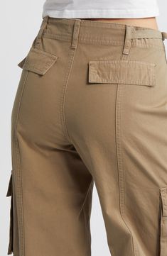 Adventure through the city in these seamed, mid-rise utility pants equipped with cargo pockets and full-length wide legs. 31 1/4" inseam, 21" leg opening; 11 1/2" front rise; 14" back rise (size 29) Zip fly with button closure Side slant pockets; back flap pockets; side flap-patch pockets 100% cotton Machine wash, tumble dry Imported Chic Over 50, Timber Wolf, Woman Back, Utility Pants, Cargo Pants Women, Wedge Sneakers, Wide Legs, Back Pocket, Pacsun