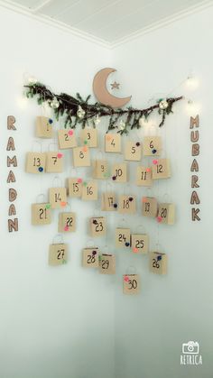 a wall hanging with calendars and lights on it