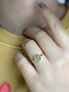 Elegant Green Opal Ring Oval Cabochon, Elegant Green Opal Ring With Oval Cabochon, Classic Green Oval Opal Ring, Modern Oval Jade Ring, Green Oval Opal Ring, Elegant Green Opal Oval Ring, Green Oval Opal Ring With Polished Finish, Luxury Green Oval Opal Ring, Modern Oval Jade Jewelry