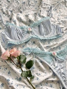 FOR LOVE & LEMONS FOR VICTORIA'S SECRET: Meet us at Versailles in this romantic blue underwire bra, featuring shearing across the top cup edges, pin-tucking, and an ultra-romantic rosette at the gore. Wear it with the matching Ellery Panty for the full lingerie set. Aesthetic Lingerie Sets, Lingerie Outfit Cute, Blue Lingerie Aesthetic, Victoria Secret Lingerie Sets, Dainty Lingerie, For Love And Lemons Lingerie, Pretty Pajamas, Cute Lingerie Sets, Lingerie Aesthetic