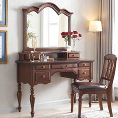 a desk with a chair and mirror in a room