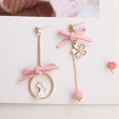 Kawaii Rabbit Sakura Earrings/Clips PN3858 ●Material: Alloy ●Size:please check our picture. ●About Shipping: We attach great importance to the orders of each customer and parcel delivery. 1.Processing time: 2-3 business days. 2.Shipping time: 10-15 business days to US, please allow 3-4 weeks shipping to other country.(Shipping times can be affected by variable customs clearance times or public holidays.) Cute Handmade Rose Gold Earrings, Cute Gold Earrings For Spring, Adjustable Kawaii Dangle Earrings, Cute Clip-on Earrings As A Gift, Cute Drop Clip-on Earrings For Gift, Cute Clip-on Drop Earrings For Gift, Cute Adjustable Clip-on Earrings As Gift, Cute Pink Hoop Earrings For Gift, Cute Pink Clip-on Earrings For Gift