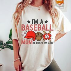 a woman wearing a t - shirt that says i'm a baseball mom