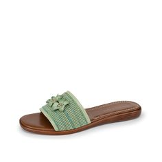 Italian Shoemakers-Ivanna Sandal Add some bloom to your step with the Ivanna sandal from Italian Shoemakers. This slide sandal features contrast, patterned strap with floral appliques for a beautiful touch. Green Slide Sandals For Spring, Spring Green Sandals With Woven Sole, Spring Open Toe Slippers With Woven Sole, Green Flip Flops With Removable Insole For Vacation, Green Sandals With Woven Sole For Beach, Adjustable Green Slides For Vacation, Luxury Green Sandals With Leather Sole, Green Open Toe Sandals With Woven Sole, Green Non-slip Slip-on Sandals