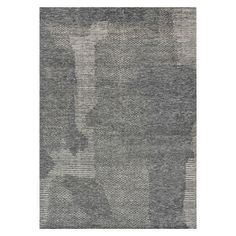 an abstract rug with grey and white colors