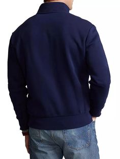 The iconic Polo Sport logo adorns the front of this streamlined quarter-zip fleece pullover..Stand collar.Long sleeves.Quarter-zip placket.Ribbed cuffs and hem.Cotton/polyester.Machine wash.Imported.SIZE & FIT.About 27.5' from shoulder to hem.ABOUT THE BRAND.Synonymous with Americana style since 1967, Ralph Lauren started with one item—the necktie—under the name Polo. The house has since stood for the epitome of refined dressing for men. From collegiate sweaters and polos to evening-ready suiting and tailored coats, there's a timeless piece for every occasion..The iconic Polo Sport logo adorns the front of this streamlined quarter-zip fleece pullover.Stand collarLong sleevesQuarter-zip placketRibbed cuffs and hemCotton/polyesterMachine washImportedSIZE & FITAbout 27.5” from shoulder to hem Long Sleeve Track Jacket With Ribbed Cuffs, Fleece Crew Neck Top With Zipper Closure, Solid Fleece Track Jacket With Long Sleeves, Long Sleeve Fleece Jacket With Ribbed Cuffs, Solid Fleece Long Sleeve Track Jacket, Fleece Sweatshirt With Zipper Closure And Long Sleeves, Long Sleeve Fleece Sweatshirt With Zipper Closure, Solid Color Long Sleeve Fleece Jacket With Ribbed Cuffs, Navy Half-zip Sweatshirt For Fall