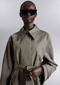 Single-Breasted Trench Coat - Khaki - Trenchcoats - & Other Stories US Spring Workwear Outerwear In Gabardine, Chic Cotton Outerwear With Button Closure, Modern Relaxed Fit Spring Outerwear, Modern Relaxed Fit Outerwear For Spring, Fitted Khaki Cotton Outerwear, Modern Oversized Cotton Outerwear, Modern Spring Outerwear With Button Closure, Modern Cotton Outerwear For Work, Modern Cotton Outerwear For Fall