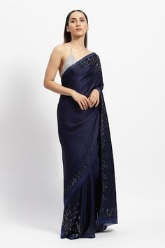 Navy blue saree embroidered with glass bugles and crystals in geometric patterns. Comes with a running blouse piece. - Aza Fashions Navratri Embellished Silk Saree, Embellished Silk Saree For Navratri, Blue Embellished Silk Traditional Wear, Embellished Chanderi Saree For Eid, Party Wear Embellished Silk Saree, Evening Blue Blouse With Mirror Work, Elegant Embellished Chanderi Blouse Piece, Evening Traditional Wear With Mirror Work, Embellished Silk Saree For Designer Wear