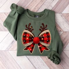 Christmas Bow Shirt, Christmas Retro Sweatshirt, Cute Christmas Sweatshirt, Christmas Gift, Christmas Family Shirt, Christmas Party T-Shirt HOW TO ORDER 1️) Please review all the information provided below before placing an order. 2️) Select the shirt type and size. 3️) Select the color of the shirt using the following options. 4) Select your design (Personalization Box) if applicable. 5) Need more items? Add your current item to your cart and if you like to add more items to your order please c Festive Holiday Crew Neck Sweatshirt, Christmas Cotton Sweatshirt, Festive Christmas Cotton Sweatshirt, Christmas Festive Cotton Sweatshirt, Festive Christmas Crew Neck Sweatshirt, Red Christmas Holiday Sweatshirt, Festive Long Sleeve Christmas T-shirt, Red Christmas Sweatshirt Gift, Christmas Family Shirt