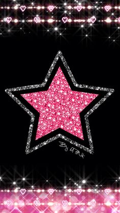 a pink glitter star on a black background with stars and sparkles in the background