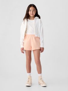 Soft cotton-blend sweat shorts.  Elasticized waist.  Raw hem.  Mid rise.  Easy pull-on waist.  Hits above the knee. Peach Parfait, Vintage Soft, Fleece Shorts, Gap Kids, Sweat Shorts, Short Girls, Vintage Children, Above The Knee, Toddler Boys