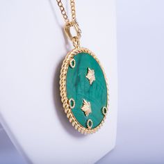 Elevate your elegance with this exquisite Van Cleef & Arpels necklace, a timeless piece from the 1950s-60s. Featuring a large, vibrant malachite pendant adorned with the Gemini zodiac sign, this necklace beautifully merges astrological significance with high-end craftsmanship. The pendant hangs gracefully from a luxurious 18K gold chain, both signed and marked with the iconic VCA signature, ensuring authenticity and quality. Embrace a piece of history and sophistication with this remarkable Van Cleef & Arpels creation. Jewelry Van Cleef, Van Cleef Arpels Necklace, Gemini Zodiac Sign, Malachite Pendant, 18k Gold Chain, Van Cleef And Arpels, Zodiac Signs Gemini, Gemini Zodiac, Van Cleef Arpels