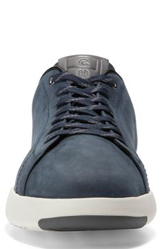 A low lace-to-toe profile cinches the timelessness of a sneaker updated with a solid leather upper for easy integration across your casual wardrobe. Signature Grand.OS technology in the footbed provides anatomically engineered cushioning and support for all-day comfort. Lace-up style Grand.OS energy-foam footbed Leather upper/textile lining/synthetic sole Imported Men's Shoes Classic Lace-up Walking Shoes With Boost Midsole, Leather Custom Sneakers With Boost Midsole, Sporty Sneakers With Plain Toe And Laces, Low-top Lace-up Shoes With Cushioned Footbed, Leather Walking Shoes With Boost Midsole And White Sole, Leather Lace-up Walking Shoes With Boost Midsole, Tennis Sneakers, Sporty Sneakers, Sneaker Men