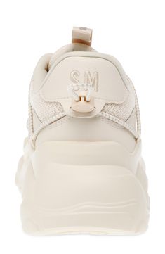 A chunky sole exaggerates the sporty, modern style of this everyday sneaker. 2 1/2" platform; 1" heel Lace-up style Textile and synthetic upper/synthetic lining and sole Imported Designer Sneakers Women, Loafers Trend, Color Bone, Trainer Heels, Business Shoes, Trainer Boots, Card Bag, Moto Boots, Designer Sneakers