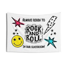 the rock and roll sign is hanging on a wall in front of a white background