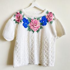 "Cute and lovely vintage handmade white shirt sleeve sweater with beautiful floral pattern in front around the neckline in pink, blue and green. Light and easy to wear fits like medium to large. Great condition! Measurements: Length 23\" Sleeve 7\" Chest 42\" Shoulder to shoulder 21\"" Green Floral Pattern, Rose Bleu, Pullover Sweater Women, White Sweater, Navy And Green, Green Light, Sweater Sleeves, White Sweaters, Women Pullover