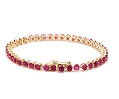 Ruby trillion cut tennis bracelet in 14k 18k gold, Natural 4mm 7-8ct ruby tennis bracelet chain gold, July birthstone red ruby bracelet gold STONE DETAILS : ✦ Gemstone: Ruby ✦ Gemstone Type : Natural ✦ Gemstone Size : 4mm ✦ Gemstone Shape : Trillion cut ✦ Number of gemstones : 43 ✦ Gemstone Weight : 7-8 carats ✦ Gemstone Grade : AAAA METAL DETAILS : ✦ Metal : 14K/18K Gold ✦ Metal Color : Yellow / White / Rose Gold ✦ Setting : Prong Setting ✦ Ring Box : Yes SHIPPING DETAILS : ✦ Shipped via ; USPS Ruby Gemstone Tennis Bracelet, Ruby Gemstone Tennis Bracelet In Fine Jewelry Style, Ruby Tennis Bracelet In Yellow Gold For Anniversary, Anniversary Ruby Tennis Bracelet In Yellow Gold, Gold Ruby Tennis Bracelet For Anniversary, Yellow Gold Ruby Tennis Bracelet For Anniversary, Anniversary Gold Ruby Tennis Bracelet, Gold Ruby Tennis Bracelet Gift, Gold Ruby Tennis Bracelet As A Gift