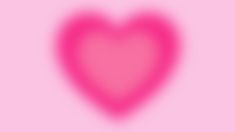 a pink heart on a pink background with the shape of a large heart in the center