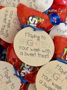 a pile of candies with writing on them that say toppling to brighten your week with a sweet treat