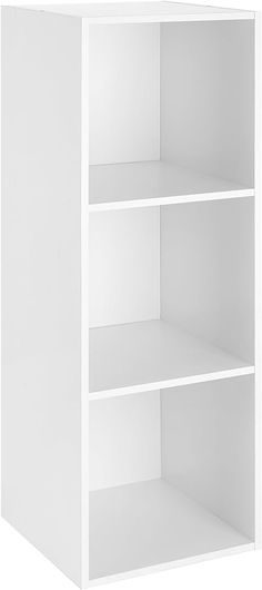 a white bookcase with three shelves on each side