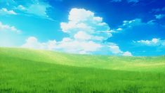 a green field with blue sky and clouds in the background is an image of grass