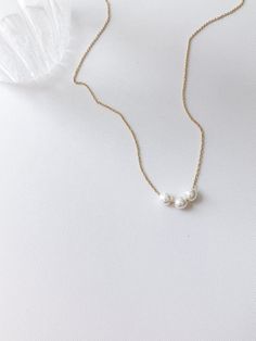 🎯Minimalist style, creating for daily wear, simple but elegant, light-weight slim chain.  * Chain length: 43cm  * Material: Freshwater pearl | 18K gold plated chain ✅[Jewelry Caring Tips] All our gold products are plated with a thick layer of 14K-24k gold giving durable plating at an affordable price. With the look of real gold, plated jewelry is a wonderful and affordable way to add a versatile choice to your jewel box To maintain the appearance, we strongly recommend avoiding water when wearing your piece, wiping them with a soft cloth after wear; keep them in proper storage to prevent oxidation. 💫[About our Packageing] Our Jewelry will be stored and shipped within an Anti Oxidation Zipper Bag along with our designed logo Linen Cotton Bag, well packed within a recycled kraft box, which Minimalist Pearl White Pearl Necklace With Clavicle Chain, Elegant White Charm Necklace For Everyday, White Pearl Necklace With Delicate Chain, Minimalist White Beaded Pearl Necklace, Everyday White 14k Gold-filled Pearl Necklace, Everyday White 14k Gold Filled Pearl Necklace, Minimalist Pearl Charm Necklace With Adjustable Chain, Minimalist Everyday Charm Necklace With Pearl Chain, Minimalist 14k Gold-filled Pearl Necklace For Everyday