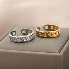 Adjustable Cuban link ring that pairs perfectly with other jewelry pieces or by itself. Your new favorite addition to your every day ring stack! Makes for a perfect gift for your loved ones or for yourself. Made of stainless steel and 18K gold-plated or silver plated - Tarnish resistant - Rust Free - Waterproof & Sweat-proof - Will not discolor - Hypoallergenic Material: Stainless Steel Color: 18K Gold Plated, Silver Plated Trendy Silver Rings With Adjustable Chain, Silver Chain Link Rings Gift, Modern Gold Plated Chain Ring As Gift, Modern Gold Plated Chain Ring For Gift, Trendy Gold Stainless Steel Rings, Trendy Open Ring With Adjustable Chain, Trendy Silver Gold-plated Rings, Tarnish Resistant Gold Plated Silver Rings, Trendy Metal Rings For Gifts