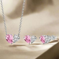 Introducing the Heart Shape Double Gem Necklace & Earrings Jewelry Set - a dainty and exquisite collection crafted from 925 sterling silver. This princess-style set features a unique heart shape created by a pink pear-shaped gem and a clear pear-shaped gem, adding a touch of romance and sparkle. The set includes a matching necklace and earrings, perfect for adding a touch of elegance to any outfit. The Heart Shape Double Gem Jewelry Set is an ideal gift for someone special or a beautiful addition to your own collection, offering a timeless blend of charm and sophistication. Pink Jewelry Set, Gem Jewelry, Princess Necklace, Heart Symbol, Zircon Jewelry, Gem Necklace, Princess Style, Gems Jewelry, Matching Necklaces