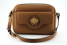 Versace Elegant Brown Leather Camera Case Shoulder Women's Bag Versace Bag, High Heel Stiefel, Versace Bags, Brown Leather Shoulder Bag, Camera Case, Timeless Accessories, Brown Bags, Metal Hardware, Satchel Bags