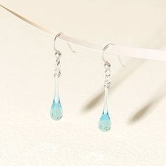 Sun-Melted Glass Droplet Earrings | Glass | Uncommon Goods Droplet Earrings, Uncommon Goods, Frozen In Time, Water Droplets, Recycled Silver, Minimalist Earrings, In Time, Piercings, Frozen