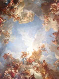 the ceiling painting is very large and has many paintings on it