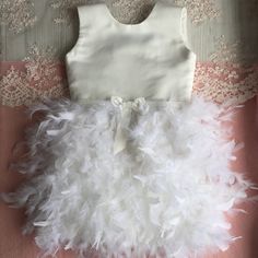 Hand made dress for girl. Your child will be like a princess in this dress. Can be as gift for girl or dress for birthday party. Color can be changed for your wish. If you need headband or jacket that matches this dress, I will make it in order. Size in centimeters 12-18 months: waist - 48-50 chest - 51-53 skirt length 21 12-24 months: waist - 49-51 chest - 52-54 skirt length 23 2 years: waist - 50-52 chest - 53-55 skirt length 25 3 years: waist - 51-53 chest - 54-56 skirt length - 27 4 years: w Elegant Feather Trim Dress For Pageant, Tulle Dresses With Feather Trim For Dress-up, Elegant Feather Trim Dresses For Dress-up, Elegant Dress With Feather Trim For Dress-up, Feather Trim Tulle Dresses For Pageants, Princess Dresses With Feather Trim For Dress-up, Princess Style Dresses With Feather Trim For Dress-up, Fitted Princess Dress With Feather Trim, Princess Style Tutu Dress With Feather Trim For Party